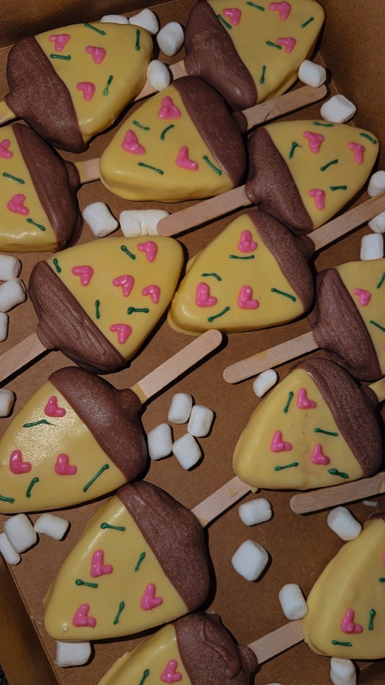 Pizza slice cake pops with pink heart pepperoni